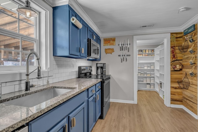 2075 Buttrey Rd, Bon Aqua, TN 37025 - kitchen featuring visible vents, electric range, light wood-type flooring, a sink, and blue cabinetry