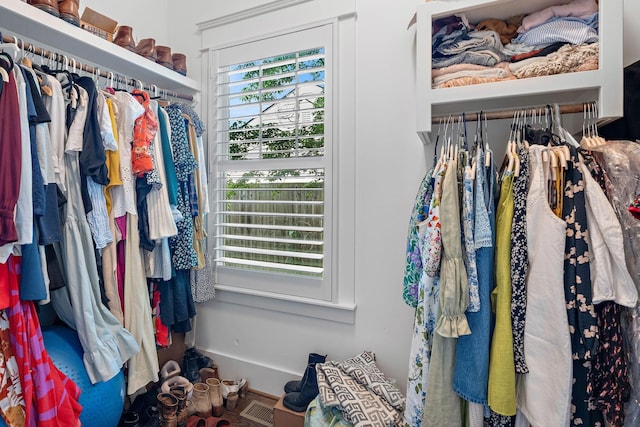 walk in closet featuring visible vents