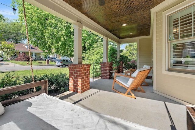 view of patio featuring a porch