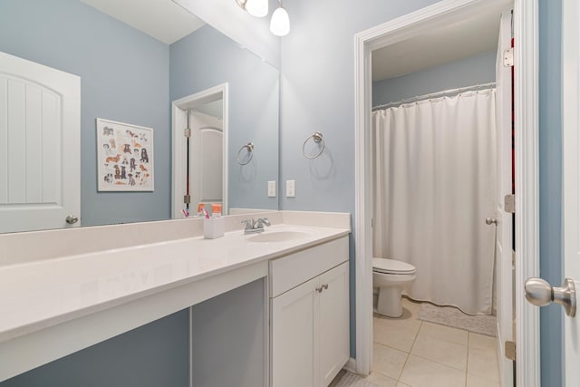 bathroom featuring toilet, a shower with shower curtain, tile patterned flooring, and vanity