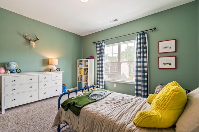 bedroom featuring carpet and visible vents