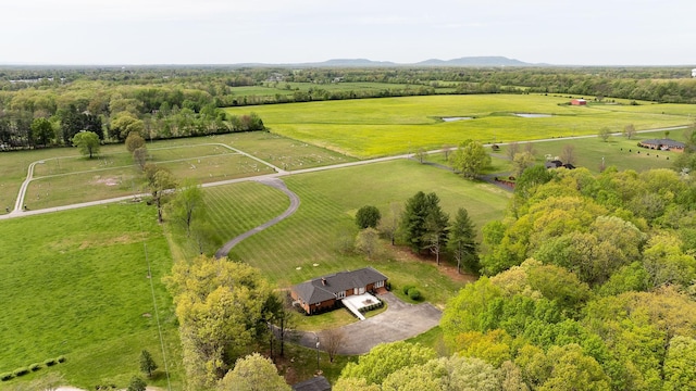 aerial view featuring a rural view and a mountain view