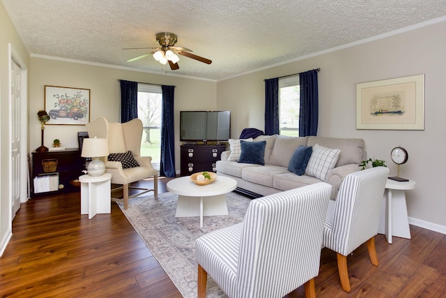 living area with a ceiling fan, a textured ceiling, dark wood-style floors, and a wealth of natural light