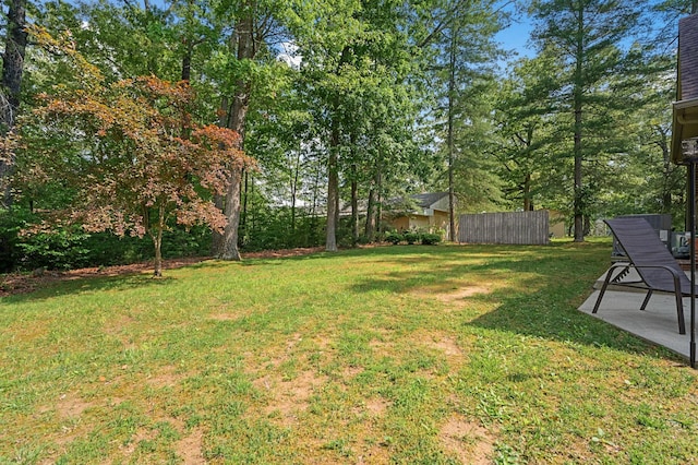 view of yard with a patio area and fence