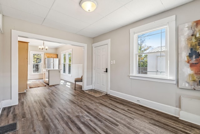 534 Greenwood Ave, Clarksville, TN 37040 - foyer entrance featuring baseboards, visible vents, dark wood-style flooring, and a chandelier