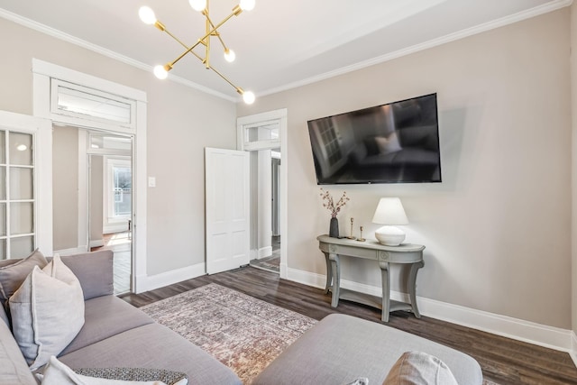 534 Greenwood Ave, Clarksville, TN 37040 - living room featuring crown molding, wood finished floors, and a notable chandelier
