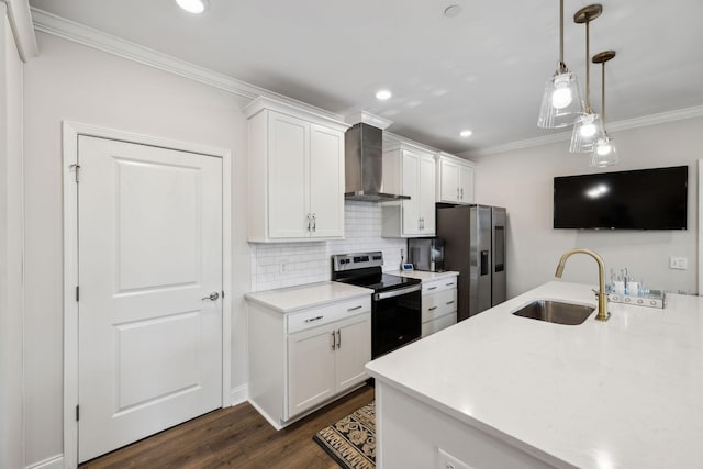 kitchen featuring ornamental molding, dark wood-style floors, wall chimney range hood, a sink, and stainless steel appliances
