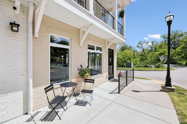 view of patio / terrace featuring a balcony