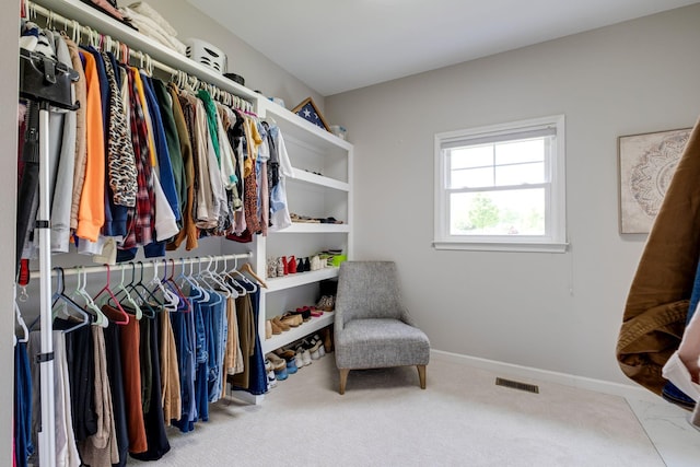walk in closet featuring carpet and visible vents