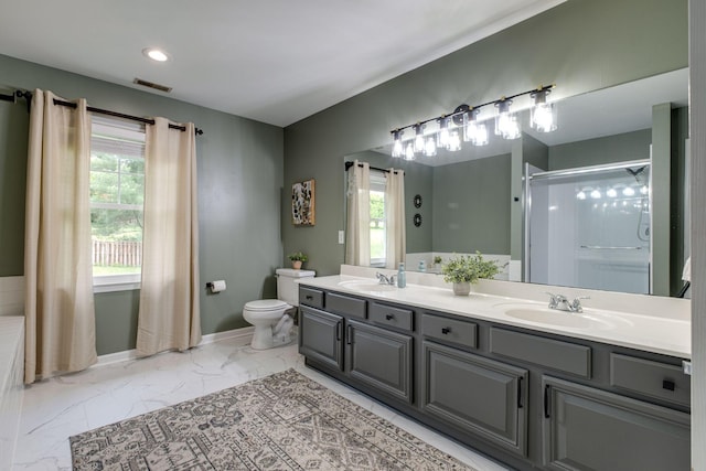 full bathroom featuring visible vents, marble finish floor, a healthy amount of sunlight, toilet, and a sink