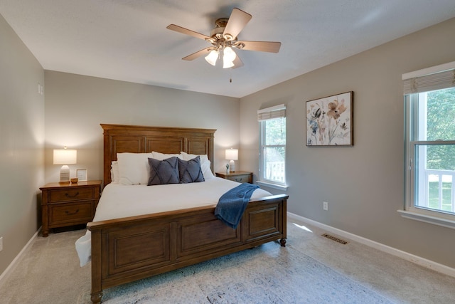 1233 Hardwood Trl, Burns, TN 37029 - bedroom with baseboards, light colored carpet, and multiple windows