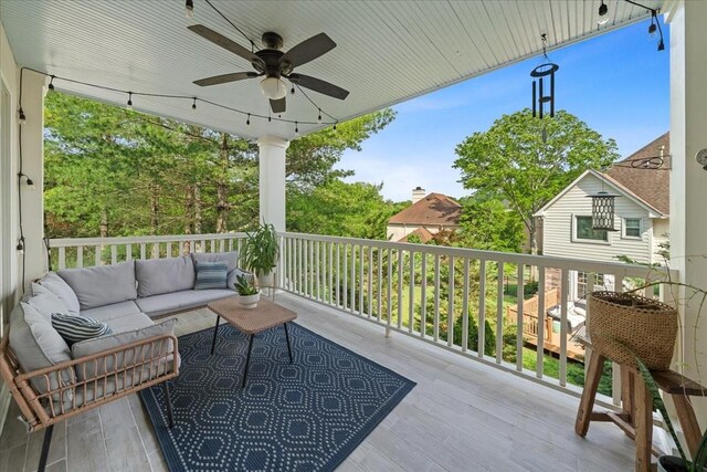 view of patio featuring ceiling fan and outdoor lounge area