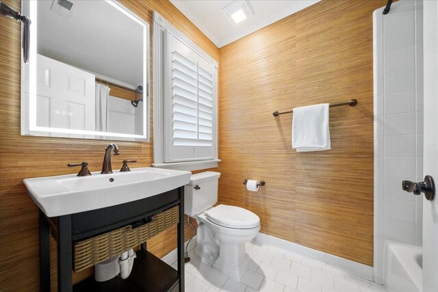 bathroom featuring tile patterned flooring, visible vents, vanity, toilet, and baseboards