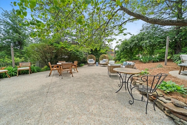 view of patio with outdoor dining area