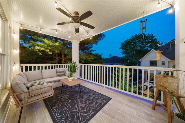 view of patio / terrace featuring a ceiling fan, outdoor lounge area, and a balcony