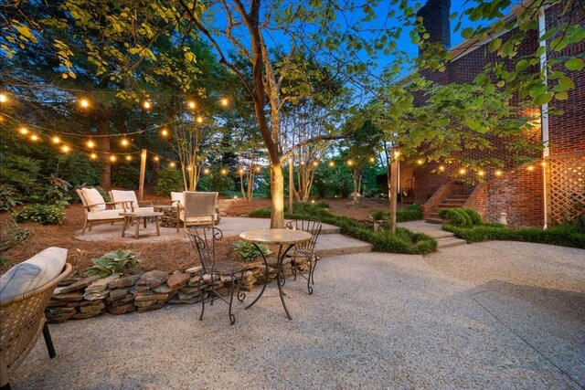 view of patio / terrace featuring stairs
