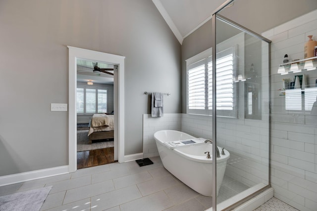 2965 Stewart Campbell Pt, Spring Hill, TN 37174 - bathroom with ceiling fan, a shower stall, tile patterned floors, lofted ceiling, and a soaking tub
