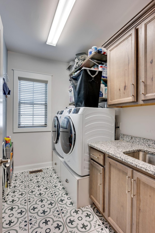 2965 Stewart Campbell Pt, Spring Hill, TN 37174 - clothes washing area with cabinet space, baseboards, visible vents, and washing machine and dryer
