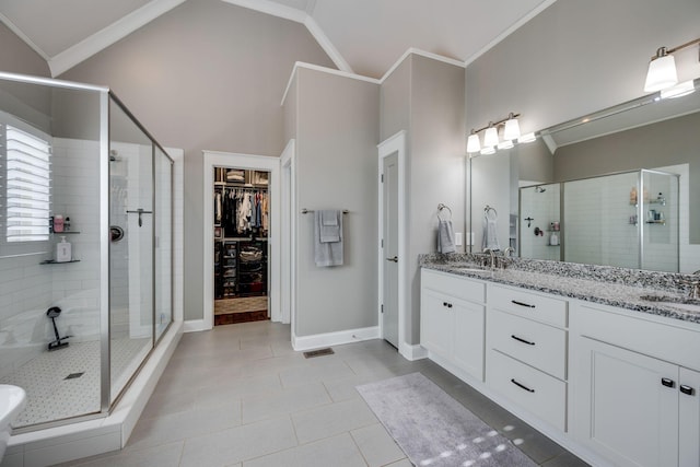 2965 Stewart Campbell Pt, Spring Hill, TN 37174 - full bathroom featuring double vanity, visible vents, tile patterned flooring, and a stall shower