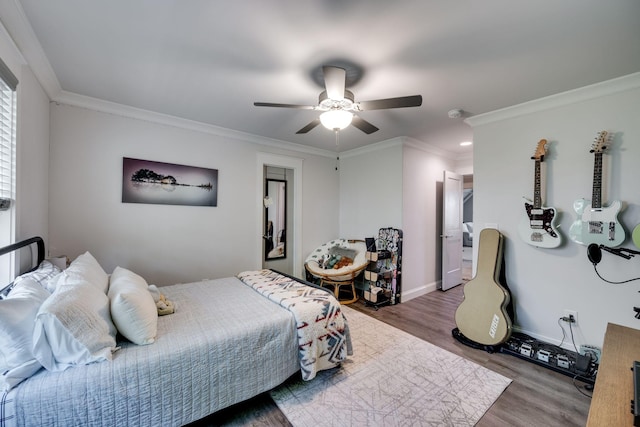 2965 Stewart Campbell Pt, Spring Hill, TN 37174 - bedroom with crown molding, ceiling fan, and wood finished floors
