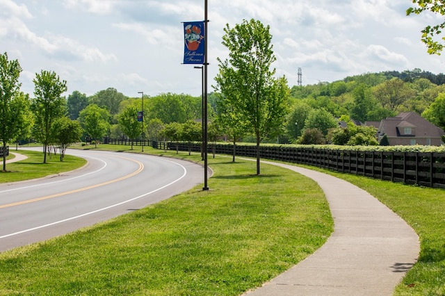 surrounding community featuring a lawn