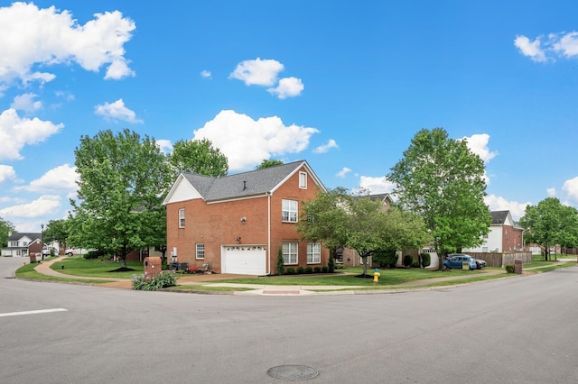view of property exterior featuring a garage, a yard, and concrete driveway