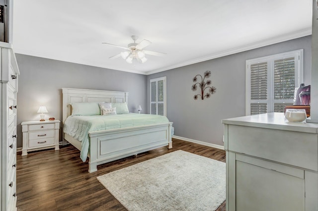bedroom featuring baseboards, ornamental molding, dark wood finished floors, and ceiling fan