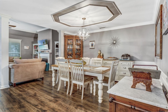 dining area featuring visible vents, ornamental molding, dark wood-style floors, and a notable chandelier