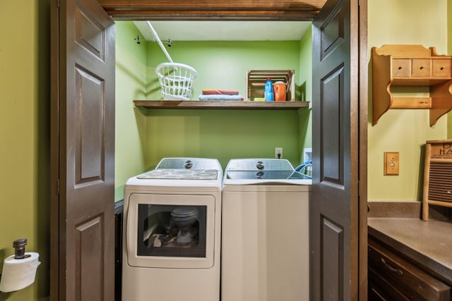 laundry area with laundry area and separate washer and dryer