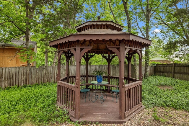 exterior space featuring a gazebo and a fenced backyard