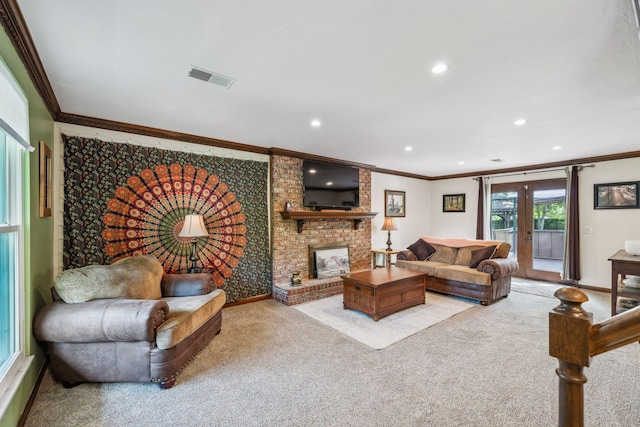 carpeted living area featuring ornamental molding, a brick fireplace, recessed lighting, and visible vents