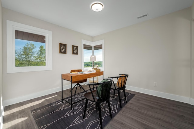 231 Wolf Ridge Ln, Lynchburg, TN 37352 - dining space with baseboards, visible vents, and dark wood-type flooring