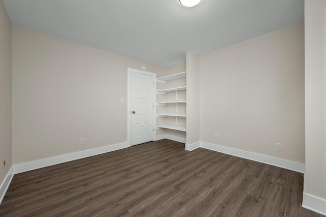 231 Wolf Ridge Ln, Lynchburg, TN 37352 - unfurnished room with baseboards and dark wood-style floors