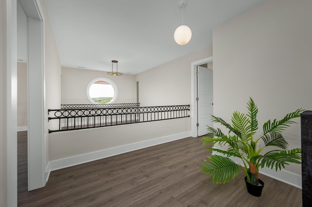 231 Wolf Ridge Ln, Lynchburg, TN 37352 - empty room featuring baseboards and wood finished floors