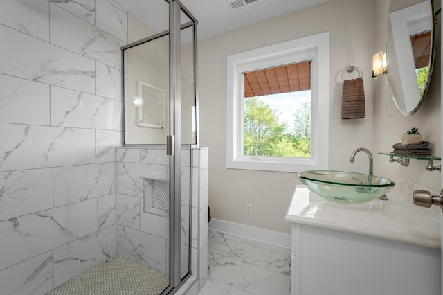 231 Wolf Ridge Ln, Lynchburg, TN 37352 - bathroom featuring vanity, baseboards, a shower stall, and marble finish floor