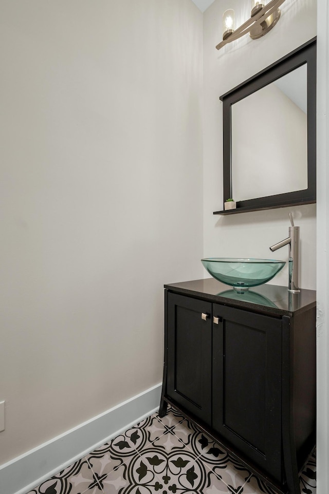 231 Wolf Ridge Ln, Lynchburg, TN 37352 - bathroom featuring baseboards and vanity