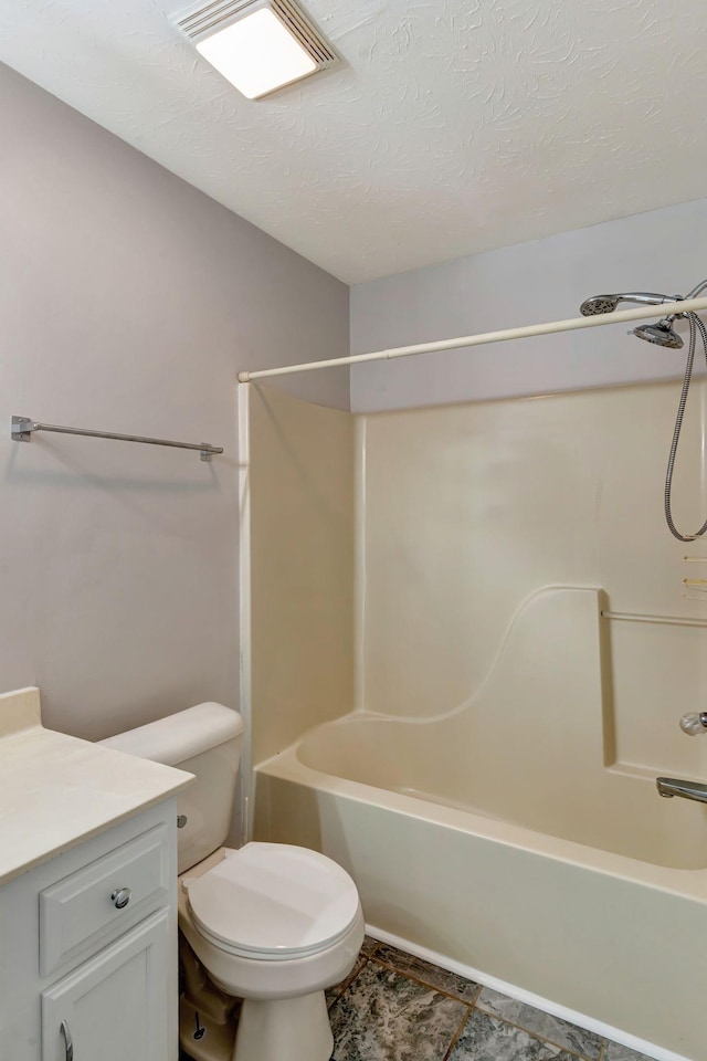 full bathroom featuring vanity, visible vents, toilet, and tub / shower combination