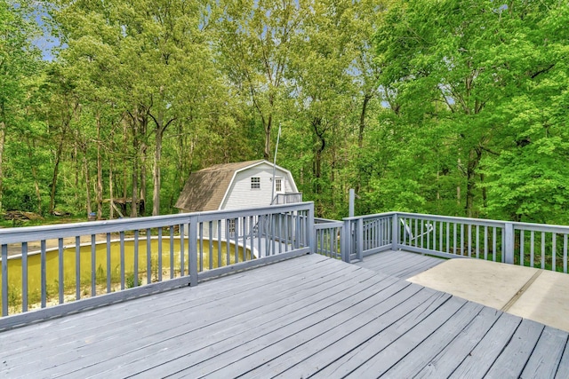 deck with an outdoor structure