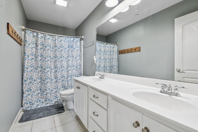 5028 Burke Trl, Nolensville, TN 37135 - bathroom featuring a sink, tile patterned floors, toilet, and double vanity