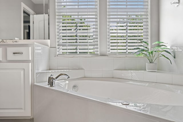 5028 Burke Trl, Nolensville, TN 37135 - full bathroom featuring a healthy amount of sunlight and a garden tub