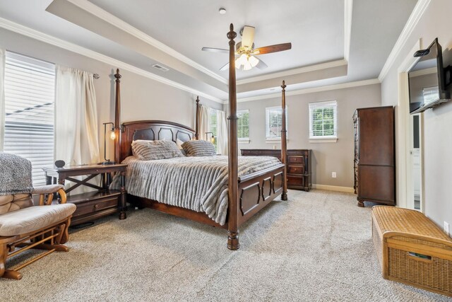 5028 Burke Trl, Nolensville, TN 37135 - bedroom with crown molding, visible vents, a tray ceiling, and light colored carpet