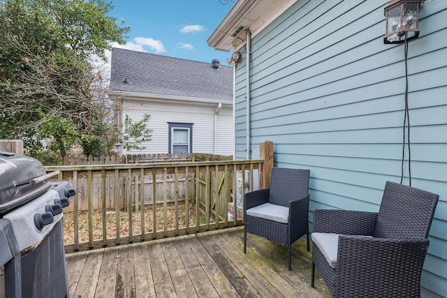 wooden terrace with grilling area