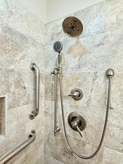 room details with a tile shower