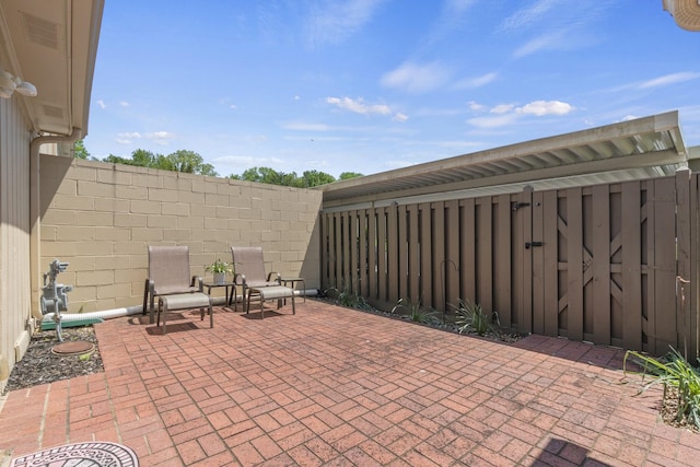 view of patio with a fenced backyard