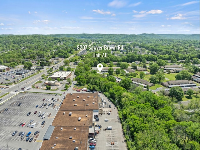 aerial view with a wooded view
