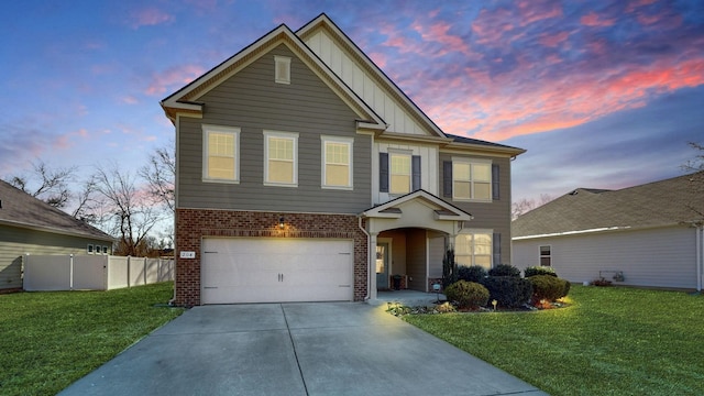 204 Princeton Dr, Lebanon, TN 37087 - view of front of property with board and batten siding, brick siding, a garage, and driveway