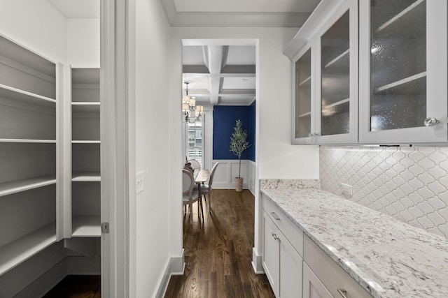 802 Montrose Ave, Nashville, TN 37204 - bar featuring beam ceiling, dark wood finished floors, tasteful backsplash, coffered ceiling, and a notable chandelier