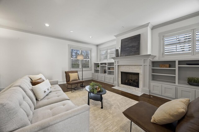 802 Montrose Ave, Nashville, TN 37204 - living area with a healthy amount of sunlight, crown molding, a fireplace, and wood finished floors
