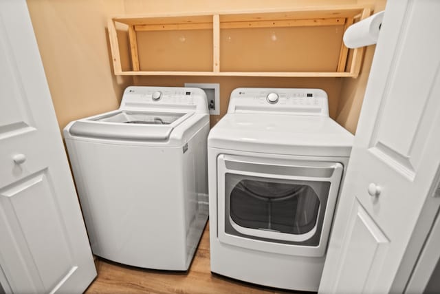1006 Grider Dr, Gallatin, TN 37066 - laundry area featuring washer and clothes dryer and light wood-style floors