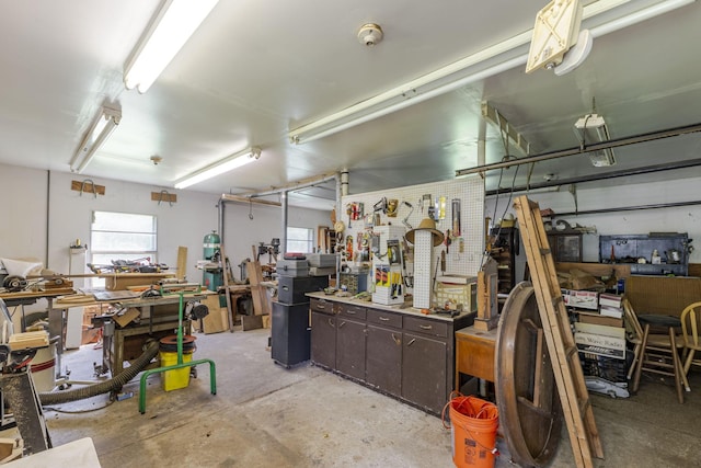 garage featuring a workshop area